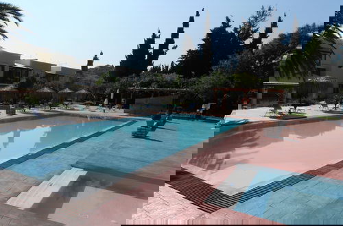 Photo 33 - Frosini Gardens