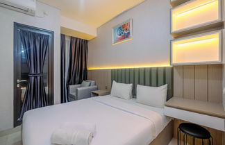 Photo 3 - Nice and Comfy Studio Apartment at Transpark Cibubur