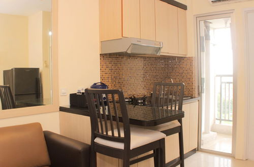 Photo 13 - Nice And Comfy 2Br At Bassura City Apartment