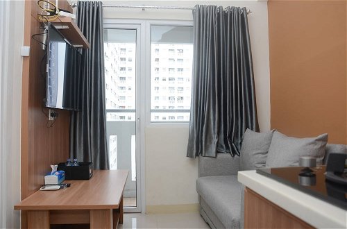 Photo 3 - Cozy 2BR Apartment at Green Pramuka City near Mall