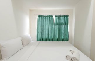 Foto 2 - Nice And Homey 2Br At Vida View Makasar Apartment