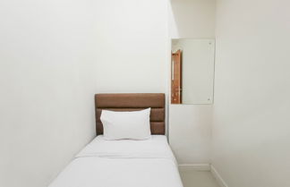 Foto 3 - Nice And Homey 2Br At Vida View Makasar Apartment