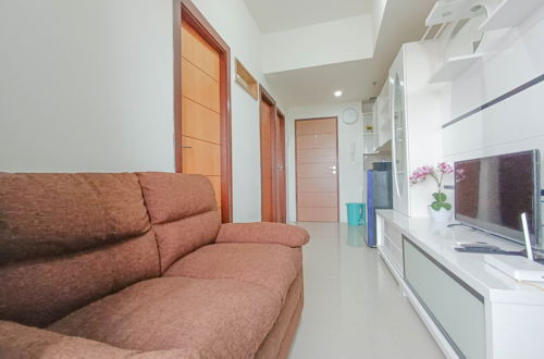 Foto 6 - Nice And Homey 2Br At Vida View Makasar Apartment
