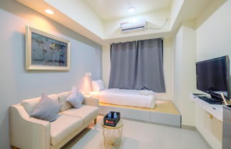 Foto 1 - Warm And Cozy Studio Evenciio Apartment Margonda Near Ui