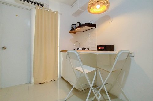 Photo 11 - Cozy Living And Simply 2Br At Bassura City Apartment