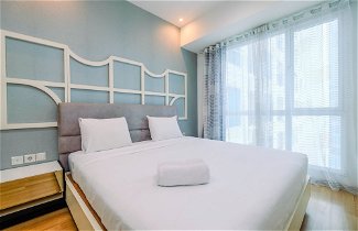 Photo 1 - Minimalist Furnished 1BR Apartment at Casa Grande Residence