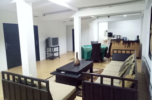 Photo 14 - T-Rooms Homestay Bandara