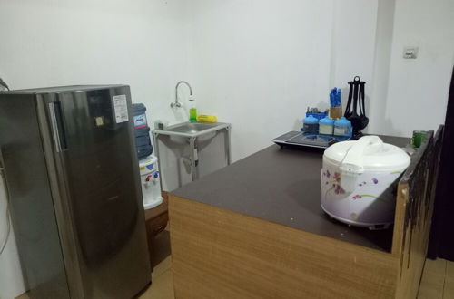 Foto 10 - T-Rooms Homestay Bandara