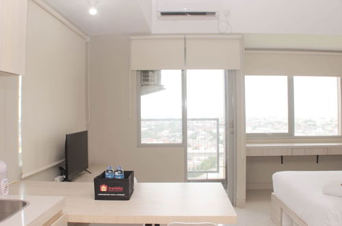 Photo 13 - Cozy Studio At Gateway Park Lrt City Bekasi Apartment