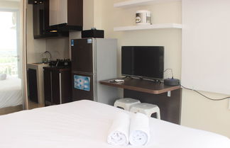 Photo 2 - Nice And Elegant Studio Apartment At Mustika Golf Residence