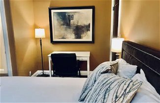 Photo 3 - Professional Three Bedroom Condo Suite