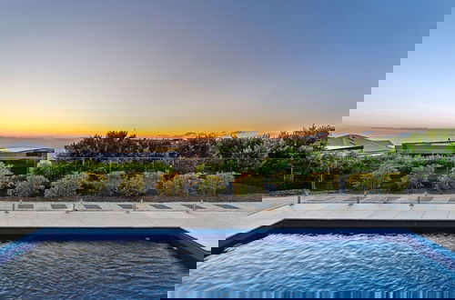 Photo 13 - Clifftop Family Retreat With Views Pool