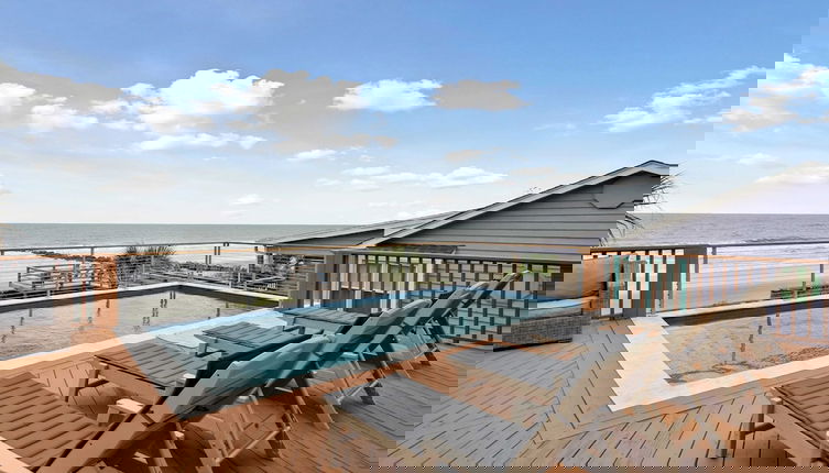 Photo 1 - Oceanfront w/ Pool, Panoramic Deck Views, 5bdr Folly Ocean Breeze by Avantstay