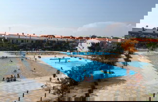 Foto 1 - Cozy House With Private Garden and Shared Pools