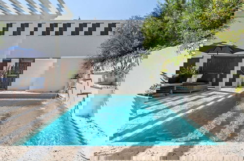 Foto 1 - Rosemary Bluegrass by Avantstay LUX Downtown Rosemary + Private Pool