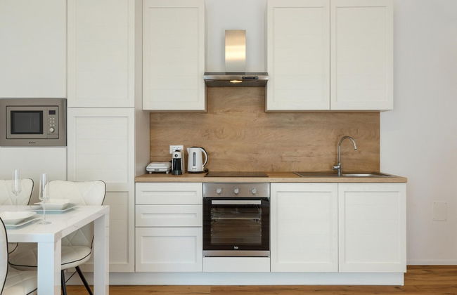 Modern Apartment With Open-air Parking - Photo 12