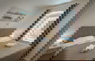 Foto 2 - Modern Apartment With Open-air Parking
