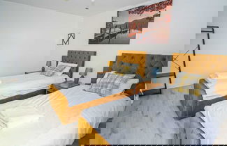 Photo 1 - Modern 4-Bedroom Home with Free Parking