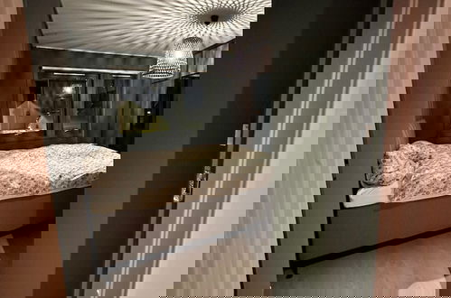Foto 4 - Modern Apartement With Parking
