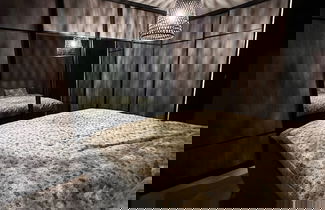 Foto 3 - Modern Apartement With Parking