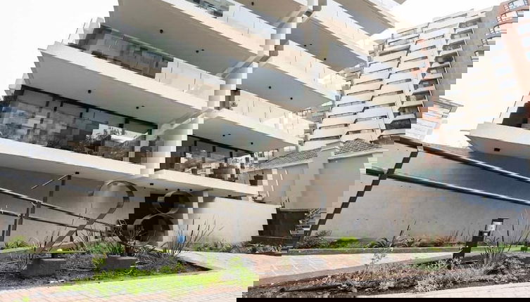 Photo 1 - Edificio Home