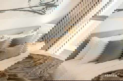 Foto 13 - Modern 2BR w Direct Beach Access Emaar Beachfront