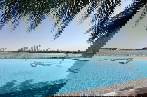 Foto 2 - Urban 1BR Palm Apt w Beach Access