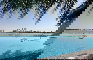 Foto 2 - Urban 1BR Palm Apt w Beach Access