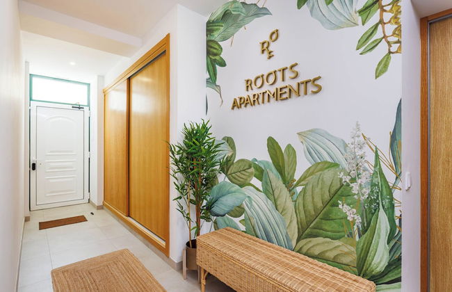 Roots Apartments - Photo 2