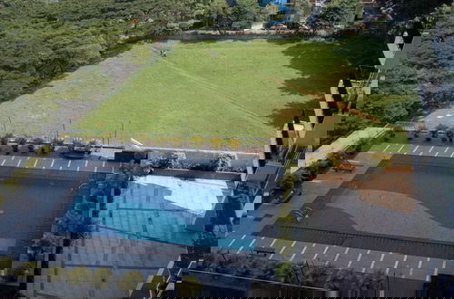 Photo 19 - Modern And Comfy 1Br Apartment Tree Park City Bsd