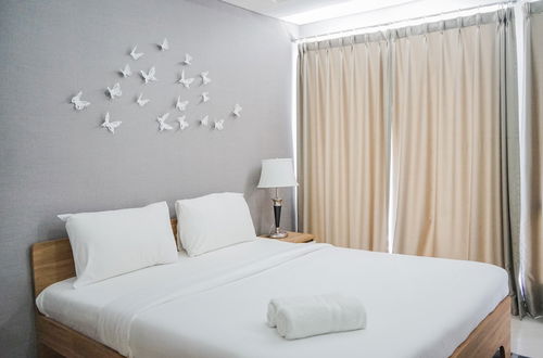 Photo 1 - Minimalist and Warm Studio Apartment at Bintaro Plaza Residence