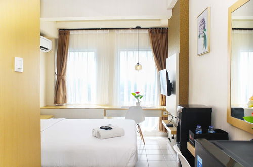 Photo 13 - Comfortable Patraland Urbano Studio Apartment Near Train Station