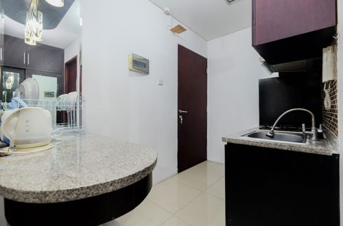 Photo 13 - Comfort Living Studio Apartment At Mangga Dua Residence