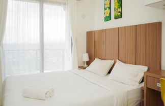 Foto 1 - Well Appointed and Homey Studio at Sky House BSD Apartment