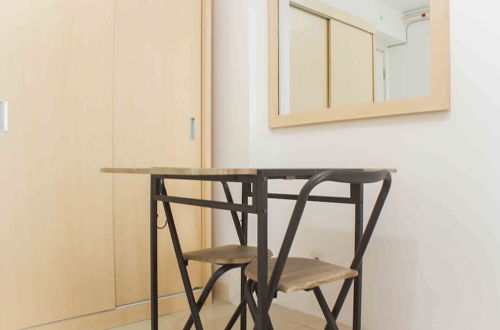 Photo 4 - Simple and Cozy Living Studio Room at Bassura City Apartment