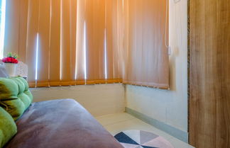 Photo 3 - Comfy and Simply Studio Room at Grand Kamala Lagoon Apartment