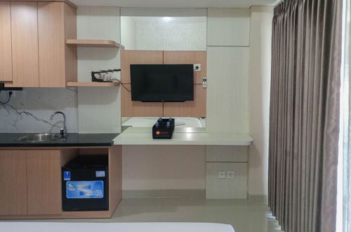 Photo 10 - Homey And Tidy Studio Apartment At Taman Melati Sinduadi