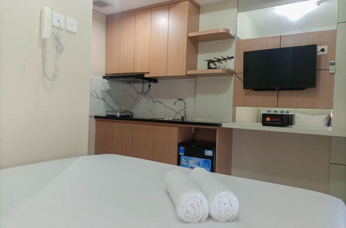 Photo 11 - Homey And Tidy Studio Apartment At Taman Melati Sinduadi