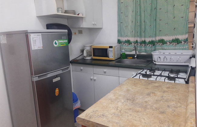 Suites & Apartments San Benito Flats - Photo 13