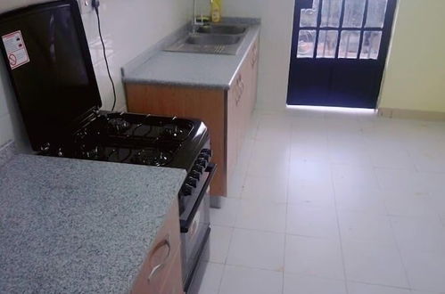 Foto 3 - Lucy Serviced Apartment