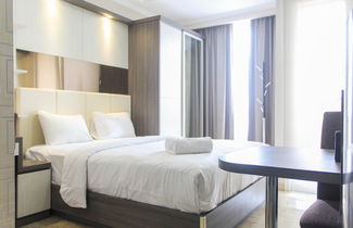 Photo 1 - Nice And Fancy Studio Room At Menteng Park Apartment