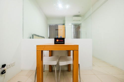 Photo 7 - Comfortable And Homey Studio At Titanium Square Apartment