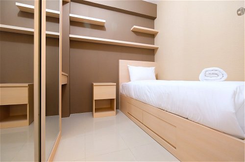 Photo 4 - Modern Minimalist 2 Bedrooms at Bassura City Apartment By Travelio