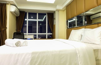 Photo 2 - Modern Furnished Studio Apartment Near MT Haryono And Cawang