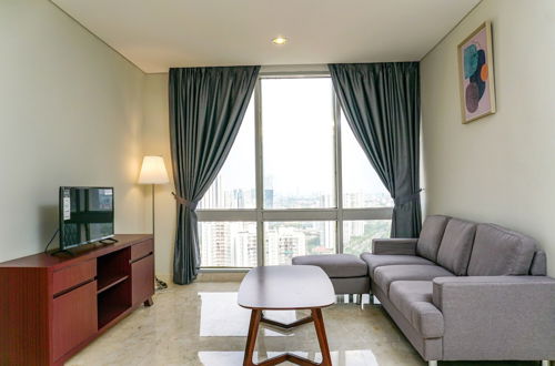 Photo 11 - Cozy 2BR @ The Empyreal Condominium Epicentrum Apartment