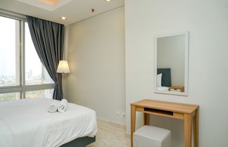 Photo 2 - Cozy 2BR @ The Empyreal Condominium Epicentrum Apartment