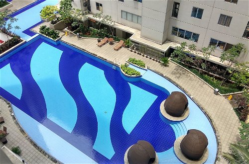Photo 17 - Minimalist 1BR with Pool View at Bassura City Apartment