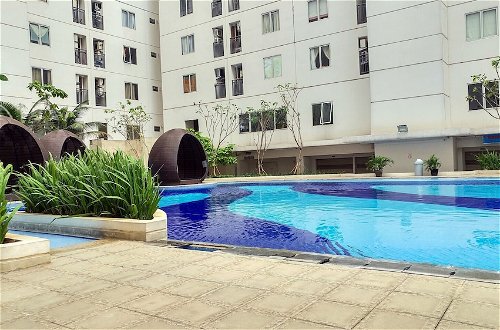Foto 13 - Minimalist 1BR with Pool View at Bassura City Apartment