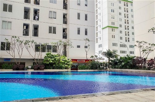 Foto 11 - Minimalist 1BR with Pool View at Bassura City Apartment