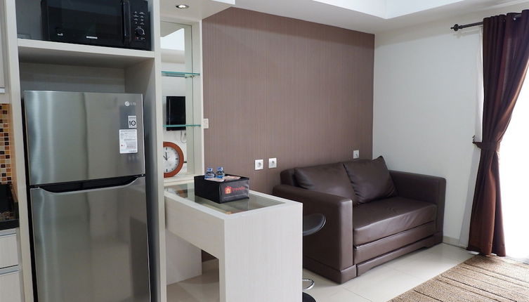 Foto 1 - Homey 1BR at The Wave near Epicentrum Kuningan